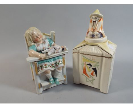Two Ceramic Lidded Boxes, One with Oriental Kneeling Gent Finial the Other as a Sleeping Child in High Chair 