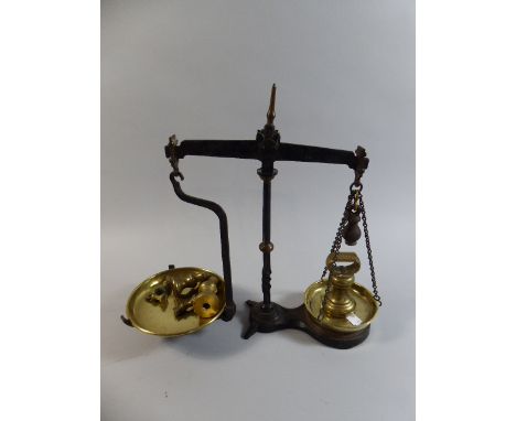 A Set of Iron Pan Scales with Brass Trays and Weights, 31cm High 