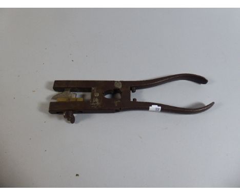 A Vintage Leather Hole Punch Cutter