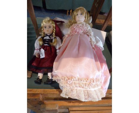 Two Ceramic Head Dolls