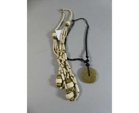 A String Necklace with Jade Circular Pendant Together with Vintage Necklace 