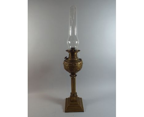 A Victorian American Oil Lamp with Stepped Square Base and Ribbed Column Support, Reservoir Decorated in Relief, The New Roch