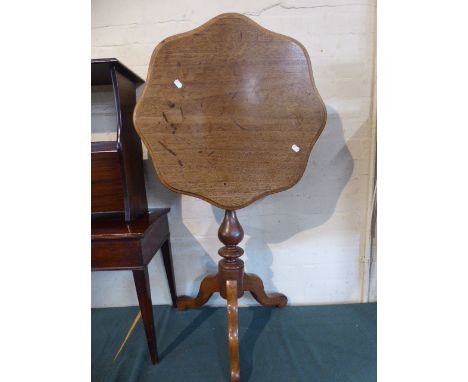 A Late 19th Century Mahogany Shaped Top Tripod Snap Top Table