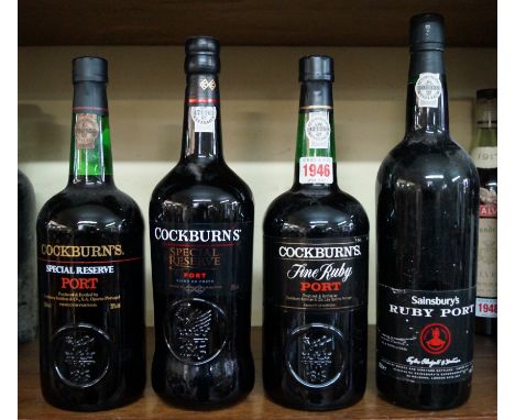 Four 1 litre bottles of port, comprising: two Cockburn's special reserve; a Cockburn's fine ruby; and a Sainsbury's ruby. (4)