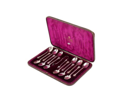A Victorian Mappin & Webb boxed silver teaspoon set. Hallmarked Sheffield 1885, comprising twelve teaspoons and a pair of sug