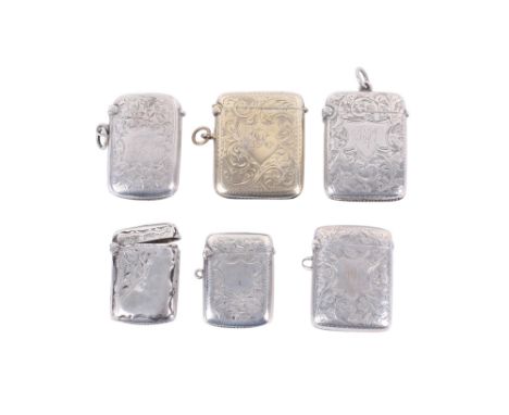 Six vintage silver vesta cases. All with hallmarks for Birmingham. engraved with scrolls and leaves, one gilt. Largest circa 