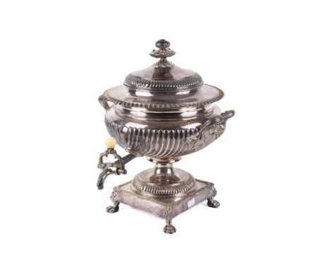A 19th century silver plated tea urn. Of compressed globular form, the hinged cover topped with a repousse finial, having twi