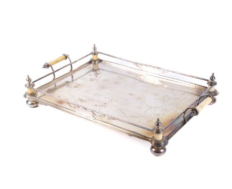 A Victorian silver plated tray. Of rectangular form, the top etched with the words 'Presented by W. H. Palmer, by the members