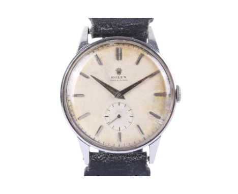 A 1950s Rolex Precision jumbo wristwatch. With metal markers to the cream face, subsidiary dial, back of the case with Rolex 