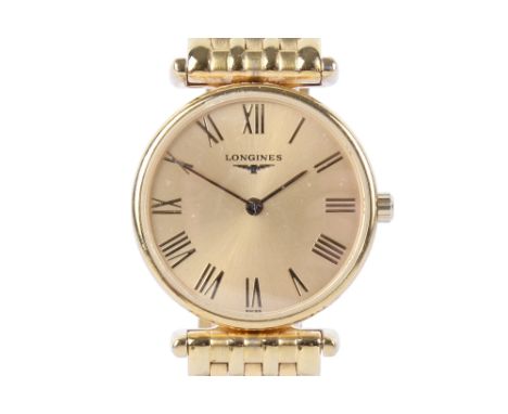 A Longines La Grande Classique lady's wristwatch. With gilt Roman numerals on a gold face, case diameter 2.3cm, on a bracelet