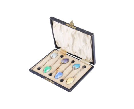 A boxed set of six George V silver and enamel coffee spoons. Maker Barker Brothers Silver Ltd, Birmingham 1930, having an Art