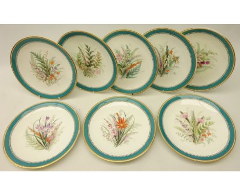 Set of eight Royal Worcester porcelain plates, decorated with floral sprays within a jewelled and turquoise blue leaf border 