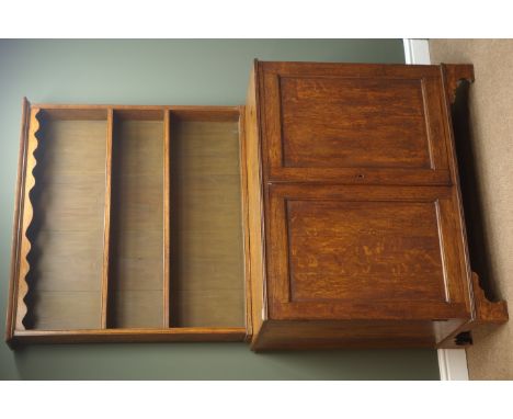 Late 18th century oak dresser, raised two tier plate rack with moulded cornice and shaped frieze, base with two panel doors o