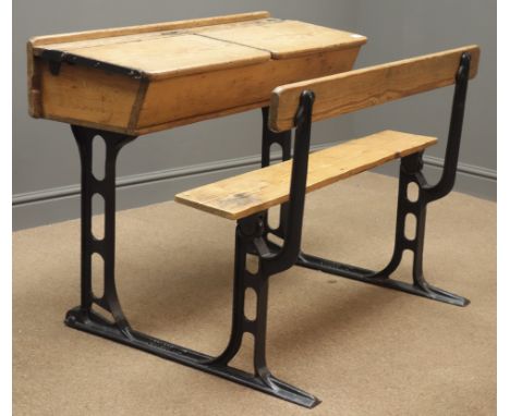 Vintage pine and cast iron double school desk, 'WELLINGTON SALOP', two hinged desk tops, sliding ink well covers, folding ben