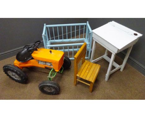 Childs Tri-ang pedal tractor, orange plastic moulded body, black wheels and black metal seat, child's desk and chair and doll