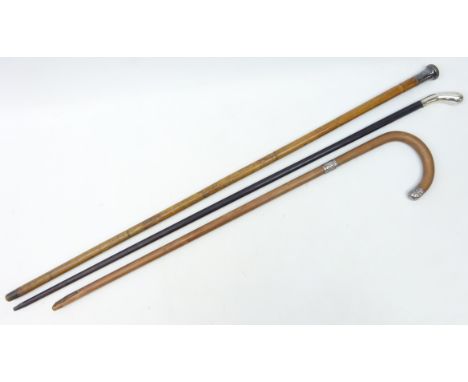 Ebonised walking cane with silver handle, London 1914, silver mounted walking stick, London 1920 (cut down), Bamboo walking c