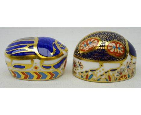 Two Royal Crown Derby paperweights, 'blue ladybird' and 'paptim', boxed, with gold stoppers Condition Report Click here for f