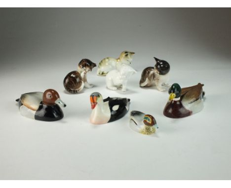 Four Beswick ducks by Peter Scott, comprising Teal, King Eider, Pochard and Mallard, together with three Royal Worcester mode