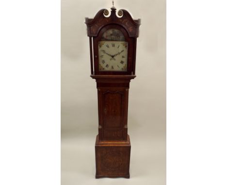 An early 19th century oak crossbanded mahogany thirty hour longcase clock, the 12 inch painted arched dial indistinctly signe