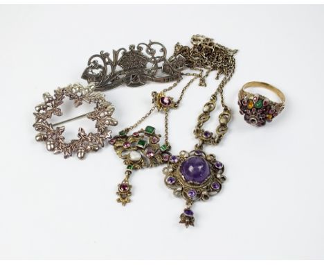 A blister pearl, garnet, emerald and paste set pendant, together with an amethyst pendant, a silver stylised acorn brooch, a 