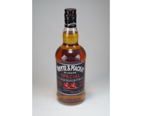 A bottle of White and Mackay Special blended Scotch Whisky, 70cl, a bottle of Bells Blended Scotch Whisky, 70cl, a bottle of 