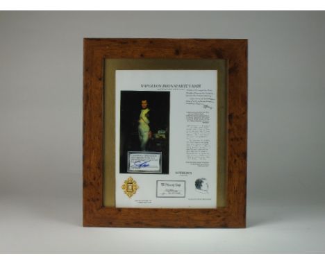 A piece of Napoleon Bonaparte's hair, as certified by Louis Mushro from the Manuscript Society; contained within small gilt f