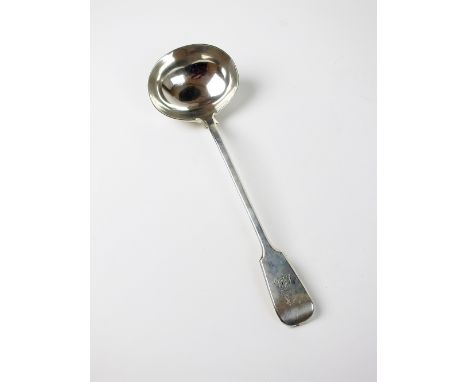 A Victorian silver Fiddle pattern soup ladle, makers mark indistinct, London 1900, with engraved crest and initials to the te