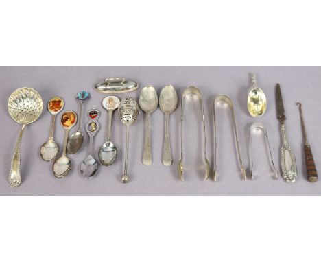 A pair of silver sugar tongs; a pair of silver teaspoons; a silver-mounted nail-buffer; a silver-plated ladle, etc. 