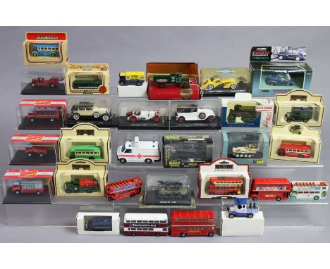 A Corgi classics scale model of “Lovejoy’s Morris Minor”; three Oxford scale model “Chipperfield’s Circus” vehicles, all boxe