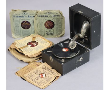 A Decca portable gramophone in a black fibre-covered case; &amp; twenty-five various records. 