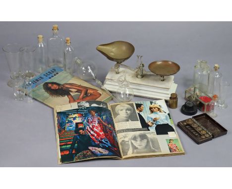A set of kitchen scales with numerous weights; two vintage scrapbooks; &amp; various glass laboratory receptacles. 