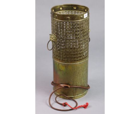 A Hong Kong brass cylindrical stick-stand with temple-dog ring side handles, 50cm high. 