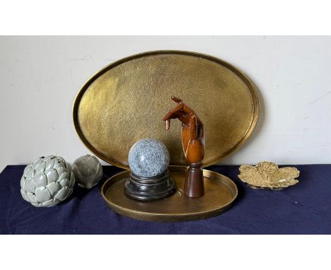 A mixed lot of ornaments and trays to include Oka artichokes pin dishes and a wooden mannequin hand 