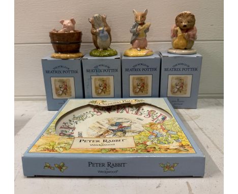 Four Royal Doulton Beatrix Potter figures and a Wedgewood Peter Rabbit Christmas plate 
