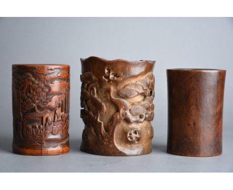 C18th/19th Chinese bamboo brush pot carved with a gathering of scholars in pavilions playing chess amidst pine trees and moun