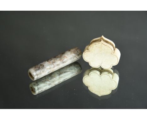 Chinese grey and russet jade cylindrical bead carved with chilong, Ming Dynasty, 6.5cm long; together with a ‘chicken bone’ j