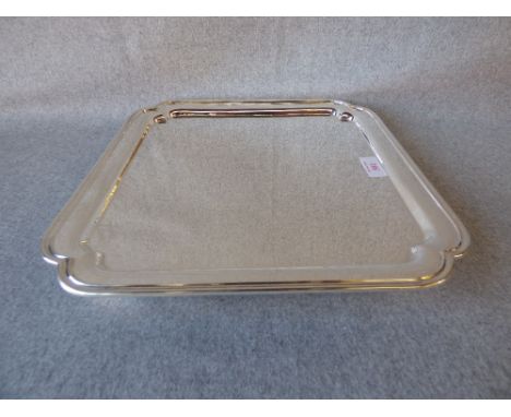 Hallmarked silver square salver in George I style on bracket feet by S J Phillips of London, 1935, 42ozt