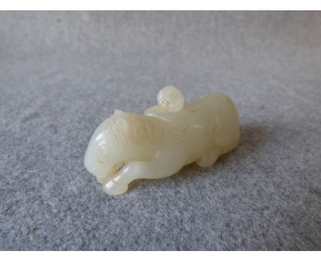  Chinese white jade figure of a monkey on a horse, 6cmL