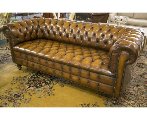 CHESTERFIELD SOFA, vintage hand finished and deep button upholstered leaf brown leather with curved back and arms, 218cm W.