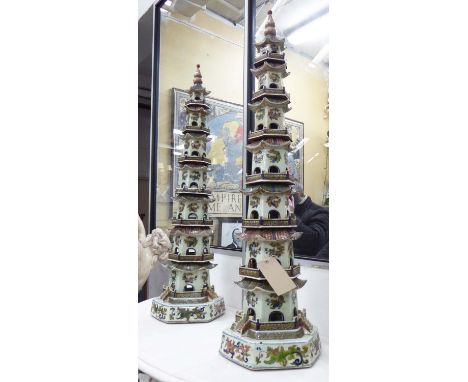PAGODAS, a pair, Chinese style, in polychromed ceramic finish, 118cm H. (2)