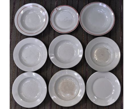 A collection of x9 original 1930s / 1940s German made Nazi Third Reich ceramic plates and bowls. All white, some with decorat