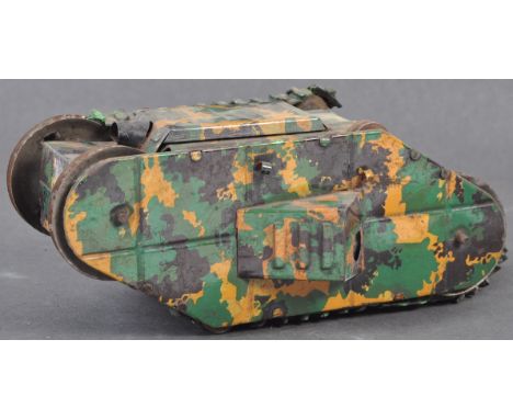 An antique c1920s likely German made clockwork tinplate model of a WWI First World War tank. Litho-printed tin construction, 
