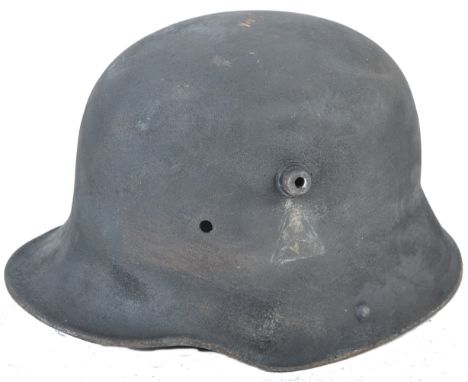 A WWI First World War interest likely inter-war period Imperial German Army steel combat Stahlhelm helmet. Faint insignia to 