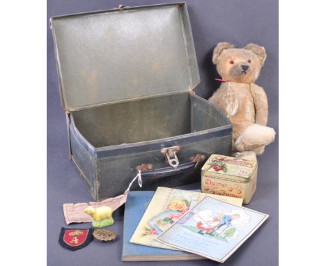 A charming WWII Second World War related ' Evacuee ' / Evacuation suitcase display. The collection comprising of a 1940s suit