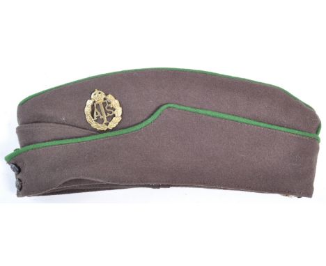 An original WWII Second World War interest British Army ATS Auxiliary Transport Service uniform side / forage cap. Brown, wit