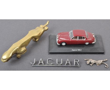 A collection of Jaguar car related memorabilia display items comprising x1 vintage brass Jaguar mascot / statue, x1 exterior 