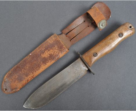 A rare original WWII Second World War period British Army issued jungle survival knife. The knife made by Wilkinson Sword Ltd