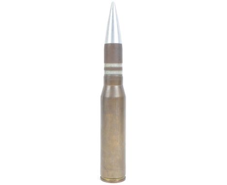 A 20th century British Army anti-tank large artillery shell casing (inert). No markings to the base, with an aluminium tip. M