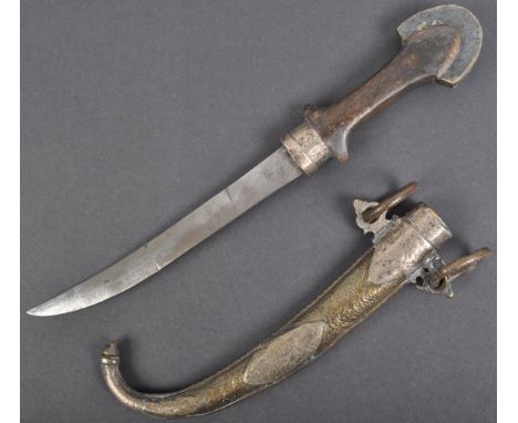 An antique early 20th century African / Moroccan Jambiya / Khanjar dagger. Shaped wooden handle, with white metal and brass m