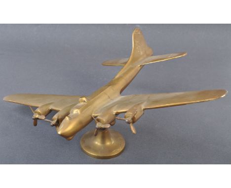 A WWII Second World War interest mid-20th century desktop brass model of a USAAF United States Army Air Force Flying Fortress